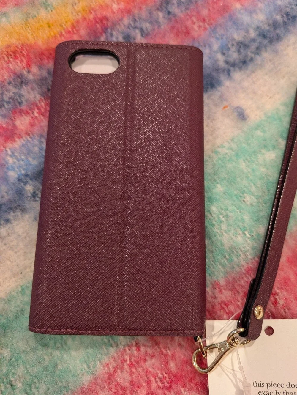 kate spade Plum Leather Wristlet Phone Case with Gold Logo